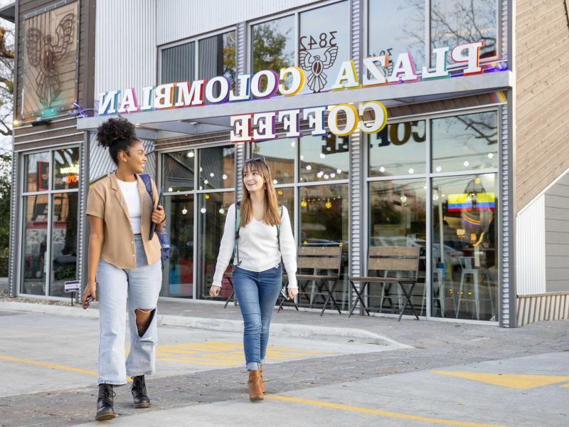 St. Ed's students walking and talking after studying at a nearby coffee shop