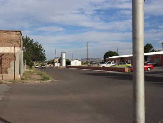 A mostly empty street in a small town